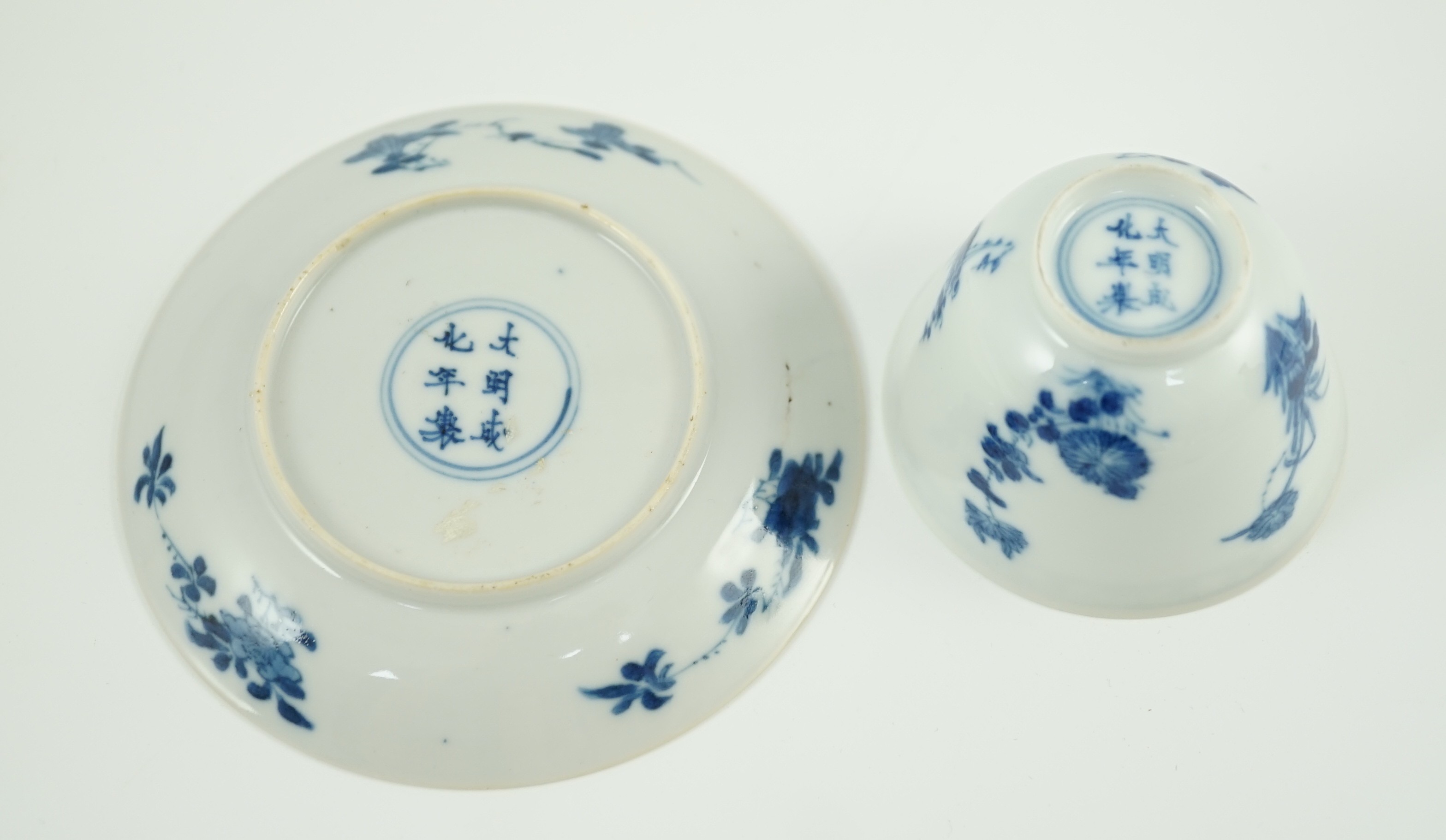 A Chinese blue and white tea bowl and saucer, Chenghua mark but Kangxi period, 9.7cm diameter